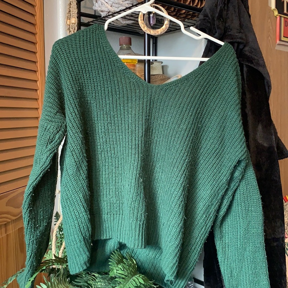 Green knitted sweater